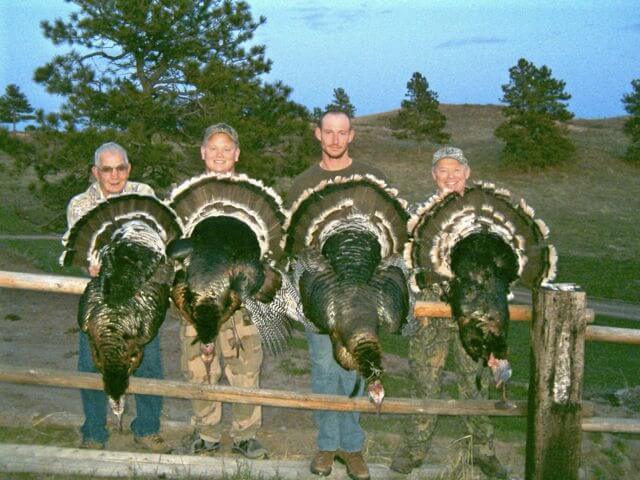 Four happy turkey hunters